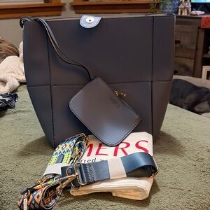 Beautiful blue Mersi cross body bucket bag.